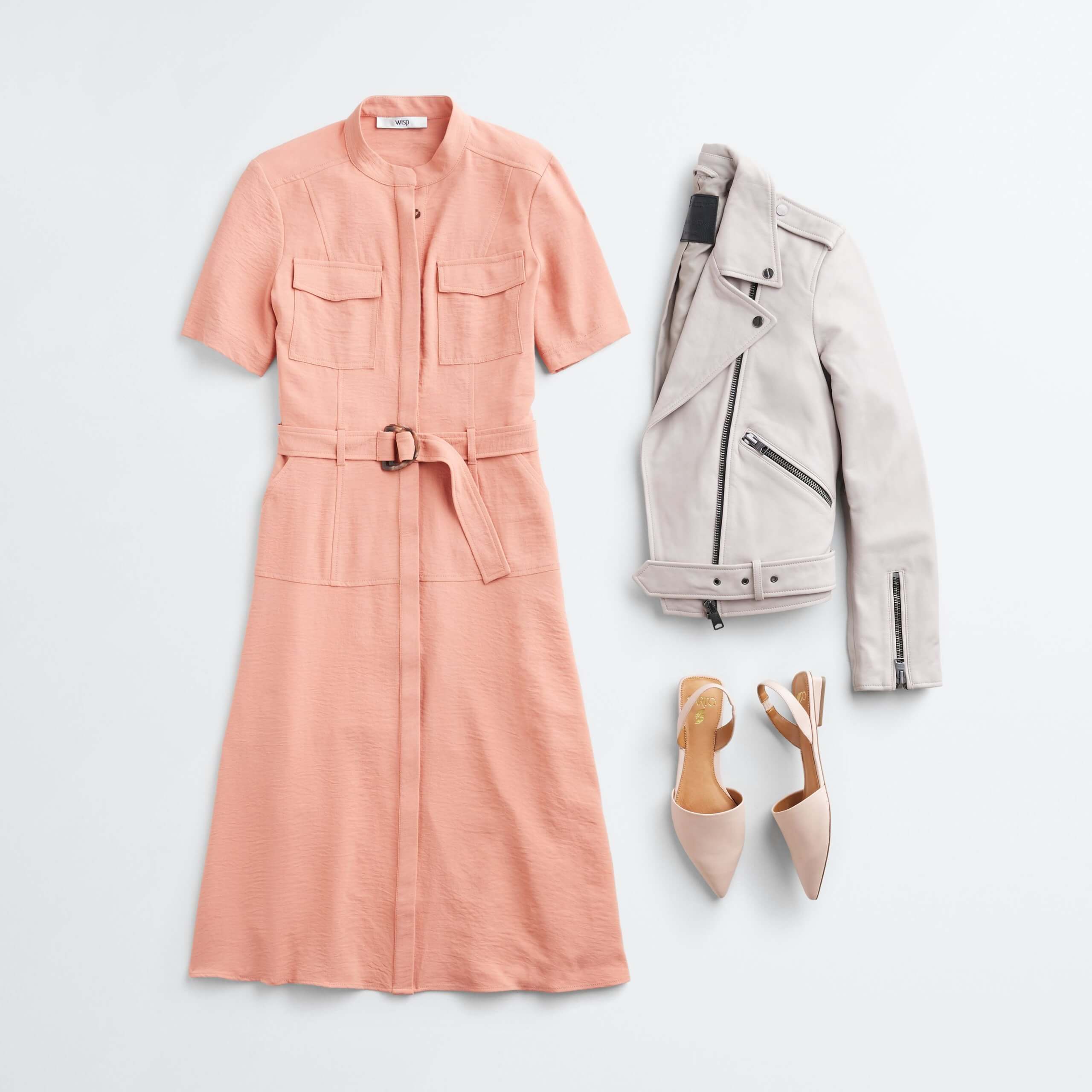 Stitch Fix Women’s outfit laydown featuring pink tie-waist shirt dress, beige leather biker jacket and beige flats.