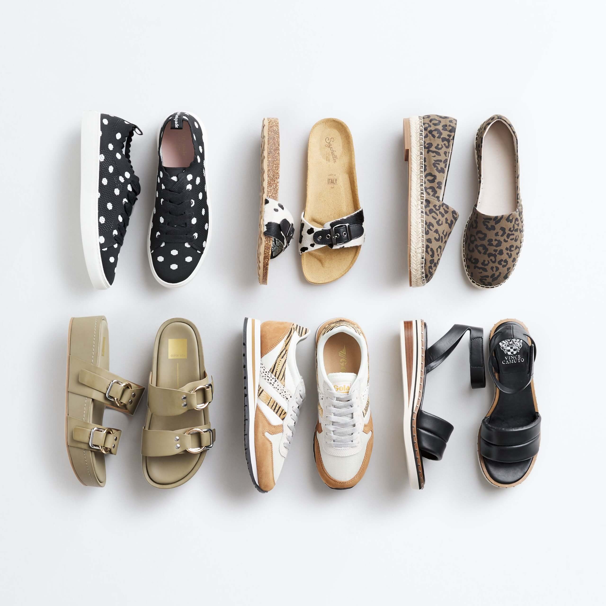 Stitch Fix Women’s shoe display featuring black polka dot sneakers, tan slide sandals with black straps, cheetah print slip-ons, olive slide sandals, white and tan sneakers, black open-toe wedges. 