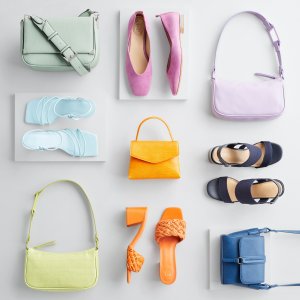 Stitch Fix women’s accessories laydown featuring green, purple, yellow, orange and blue shoes and accessories.