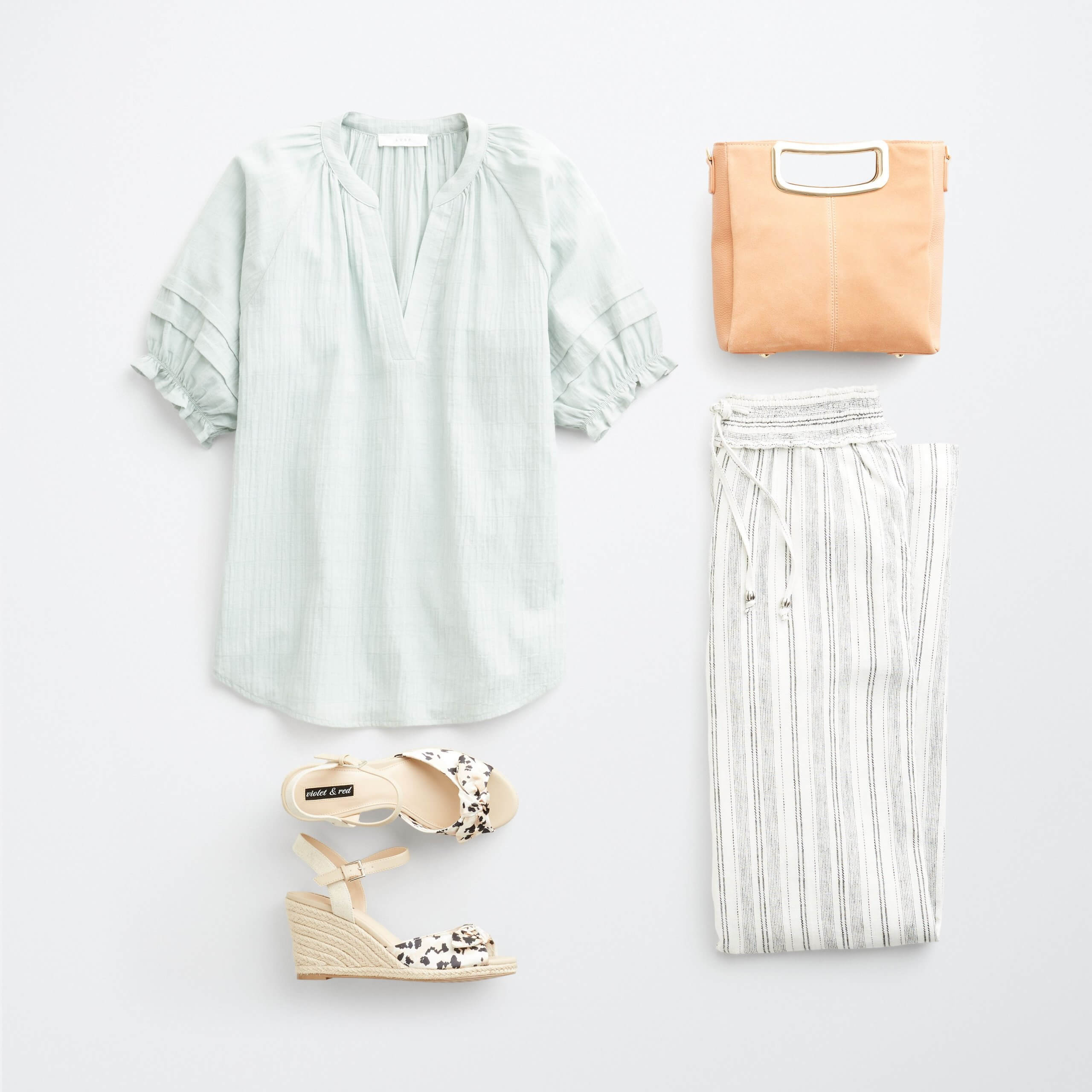 Stitch Fix Women's outfit laydown featuring mint green ruffle sleeve top, white striped wide-leg pants, tan animal print wedges, brown bag. 