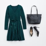 Stitch Fix women’s holiday party outfit featuring green dress with sash, black tote and heels with gold buckle embellishment.