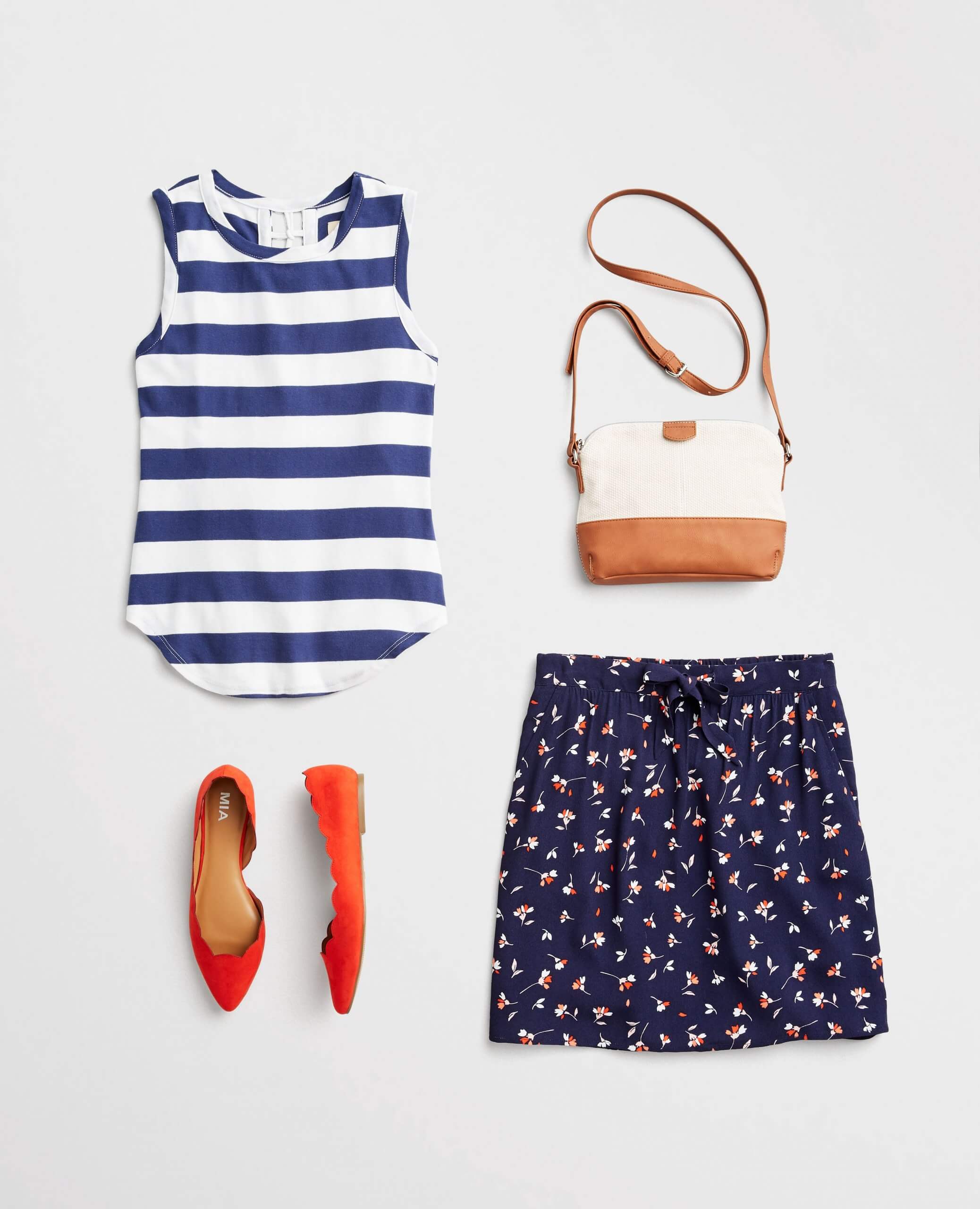 Stitch Fix women's 4th of July outfit laydown featuring a navy floral skirt, red flat shoes, striped tank top and white purse.