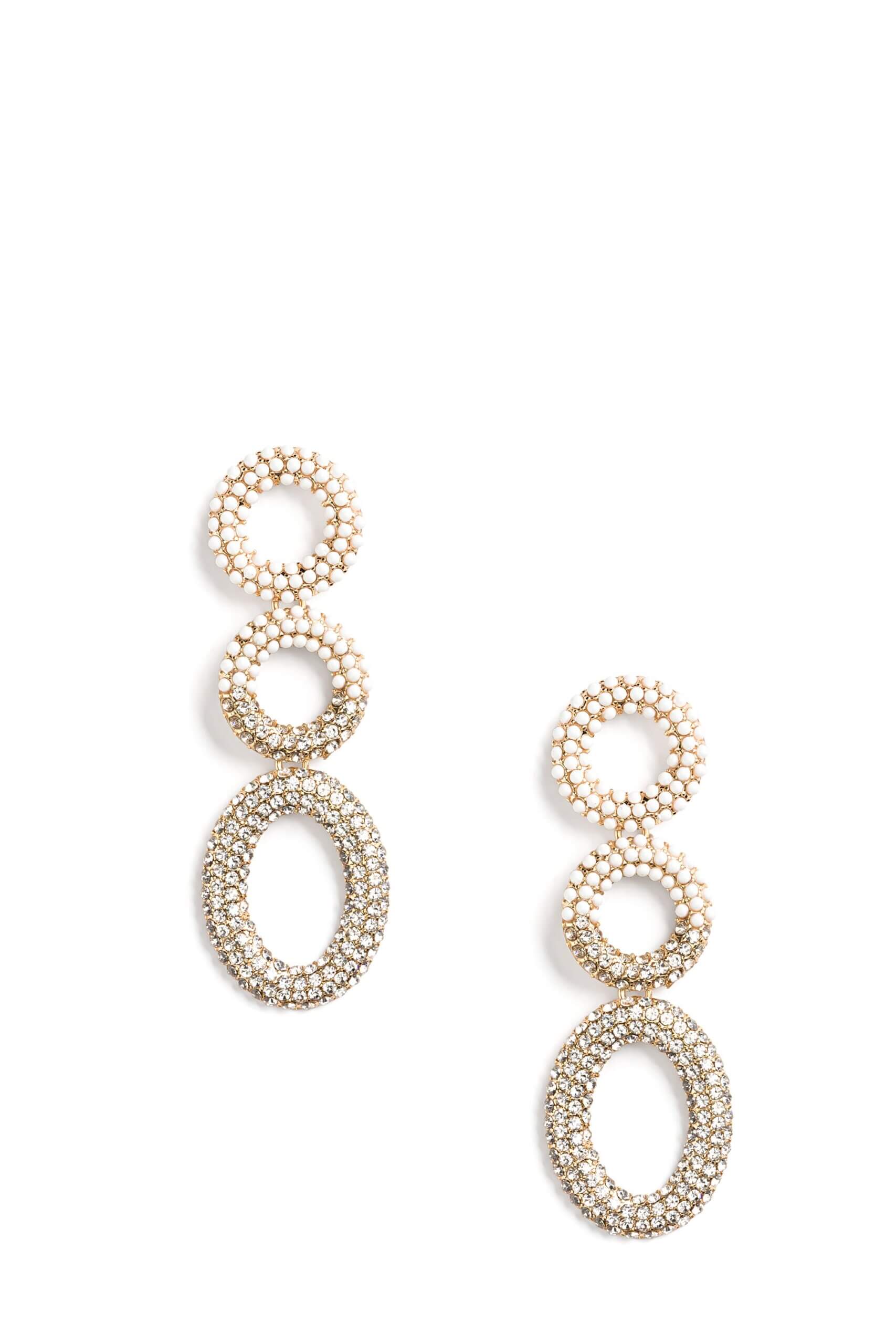 Stitch Fix Women’s accessories featuring circle and oval drop earrings with pearl embellishments.