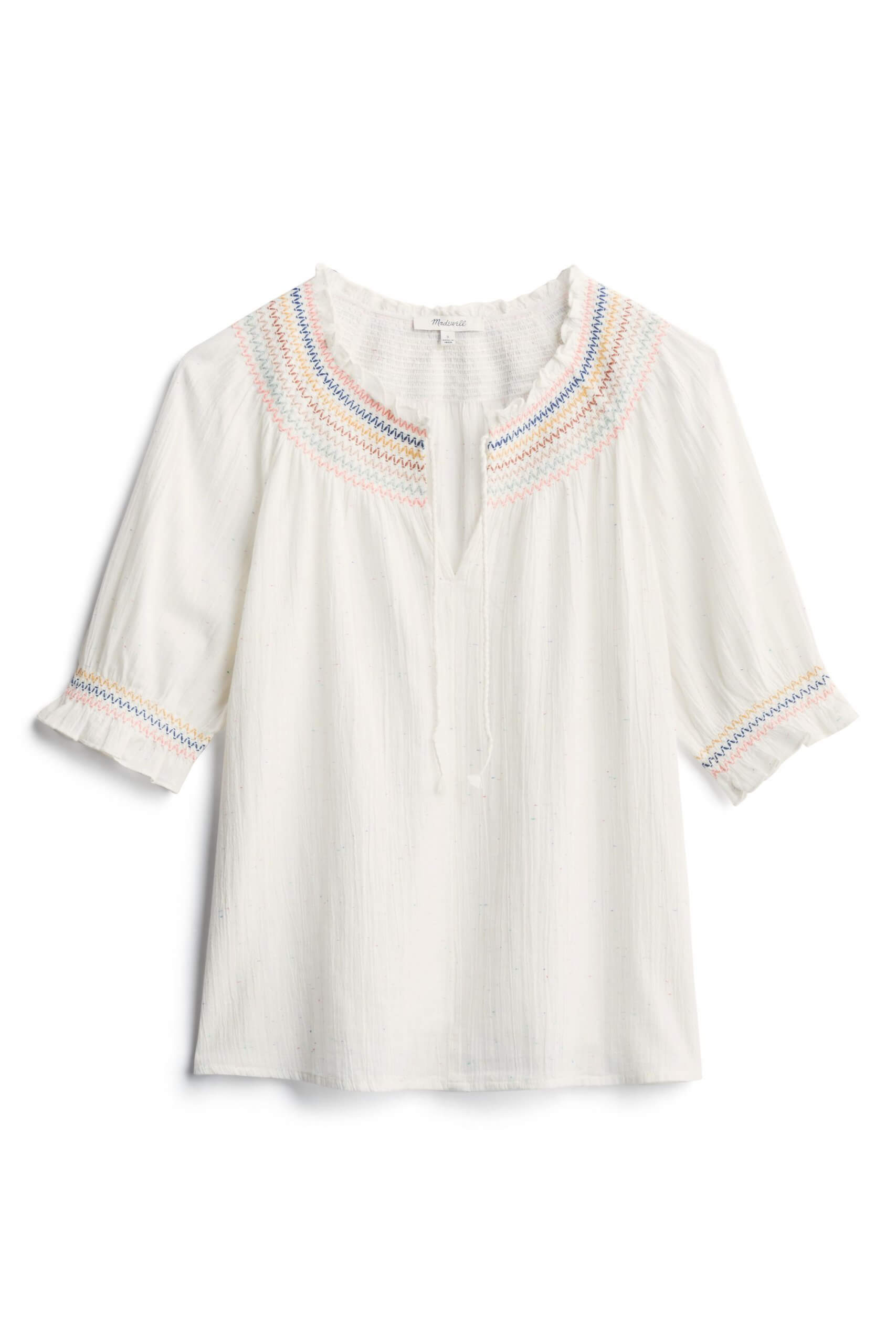 Stitch Fix women’s white short-sleeve shirt with colorful embroidered neckline.