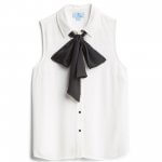 Stitch Fix women’s white sleeveless blouse with black bow neckline detail.