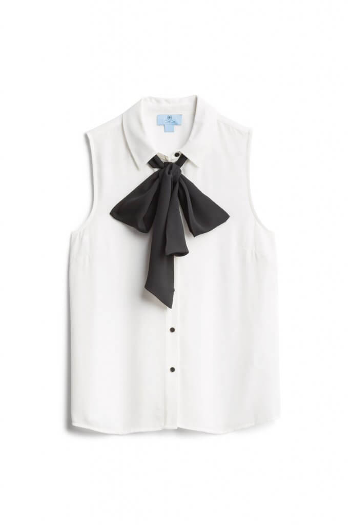 Stitch Fix women’s white sleeveless blouse with black bow neckline detail.