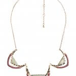 Stitch Fix women’s gold necklace with triangular stone detail.