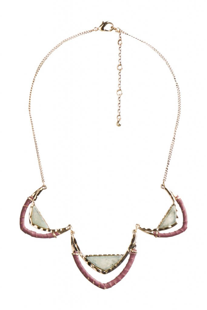 Stitch Fix women’s gold necklace with triangular stone detail.