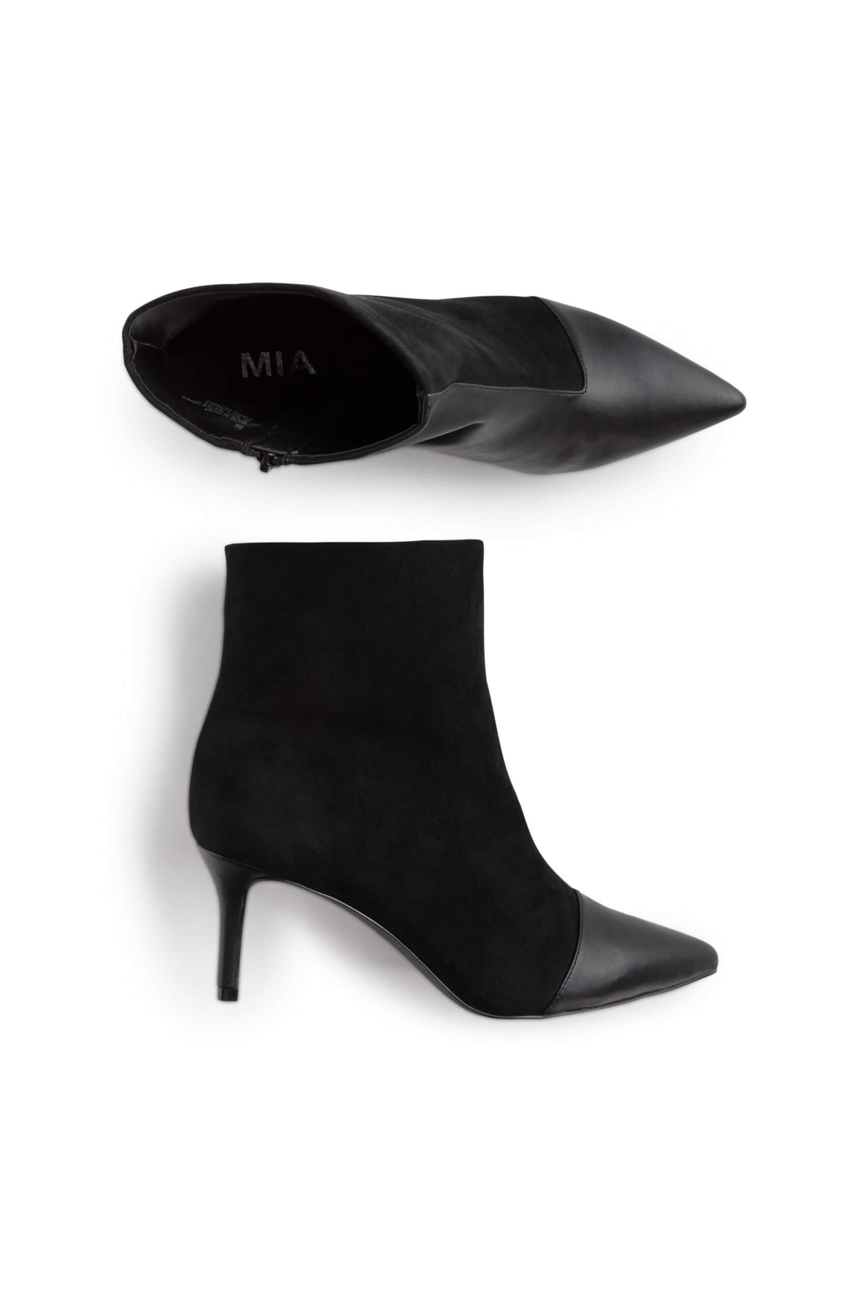 Stitch Fix women’s black ankle boots with pointed toe and stiletto kitten heel.