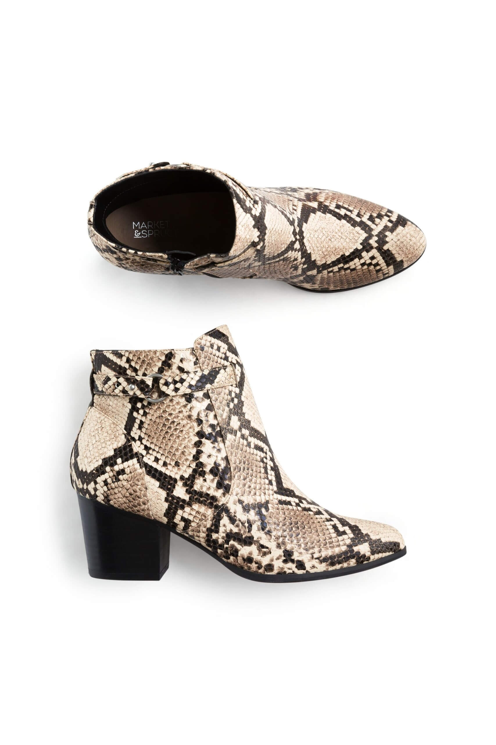 Stitch Fix Women’s Collection featuring black and cream snakeskin print leather ankle boots.