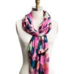 Stitch Fix women's purple, pink, teal and green abstract print scarf on bust form.