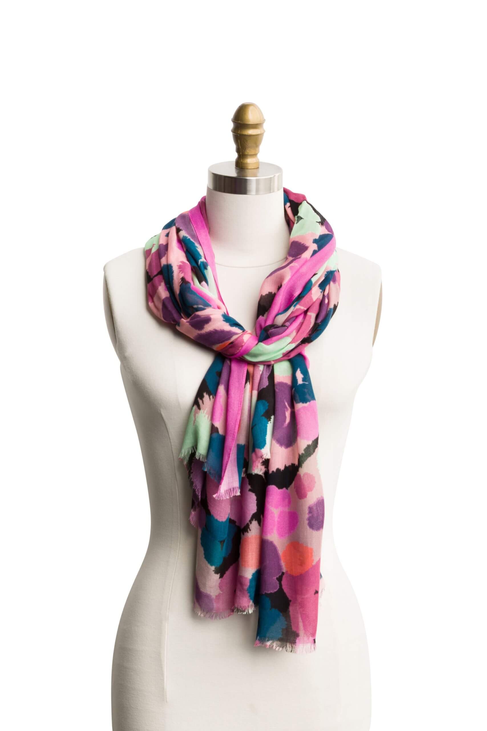 Stitch Fix women's purple, pink, teal and green abstract print scarf on bust form.