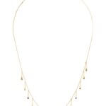Stitch Fix women’s gold necklace with assorted colored gem drop details.