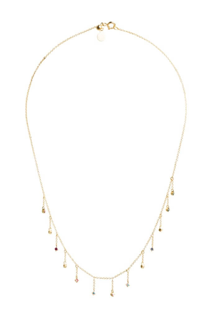 Stitch Fix women’s gold necklace with assorted colored gem drop details.
