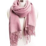 Stitch Fix women's pink scarf with fringe ends.