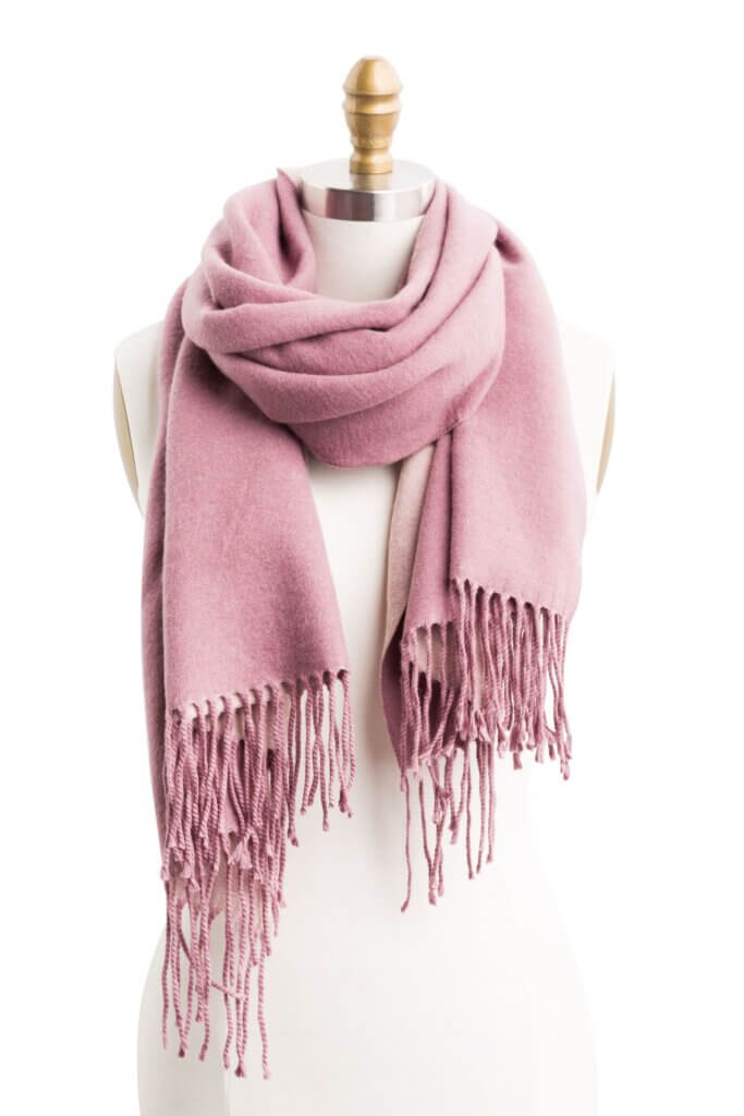 Stitch Fix women's pink scarf with fringe ends.