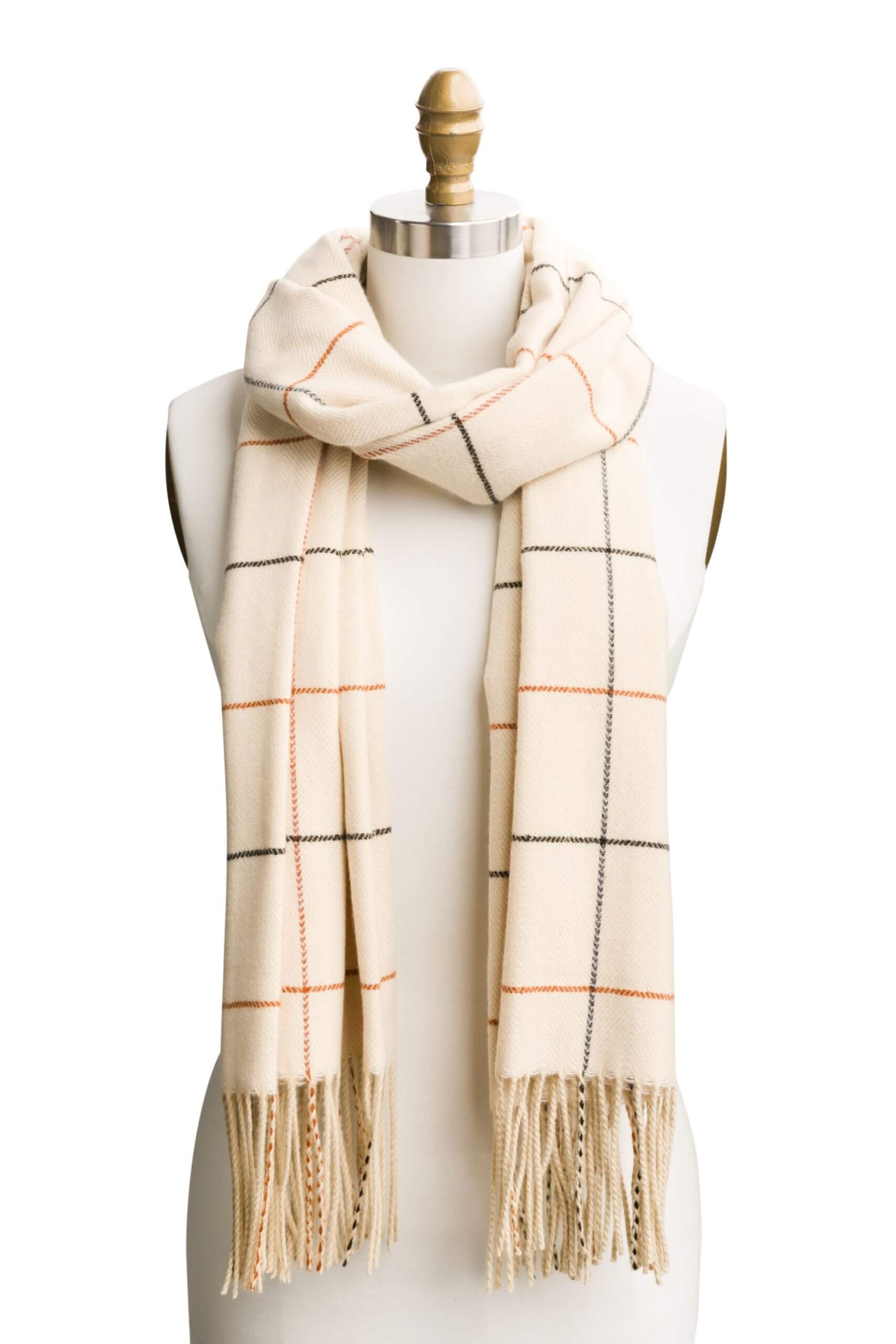 Stitch Fix women's camel scarf with fringe ends.