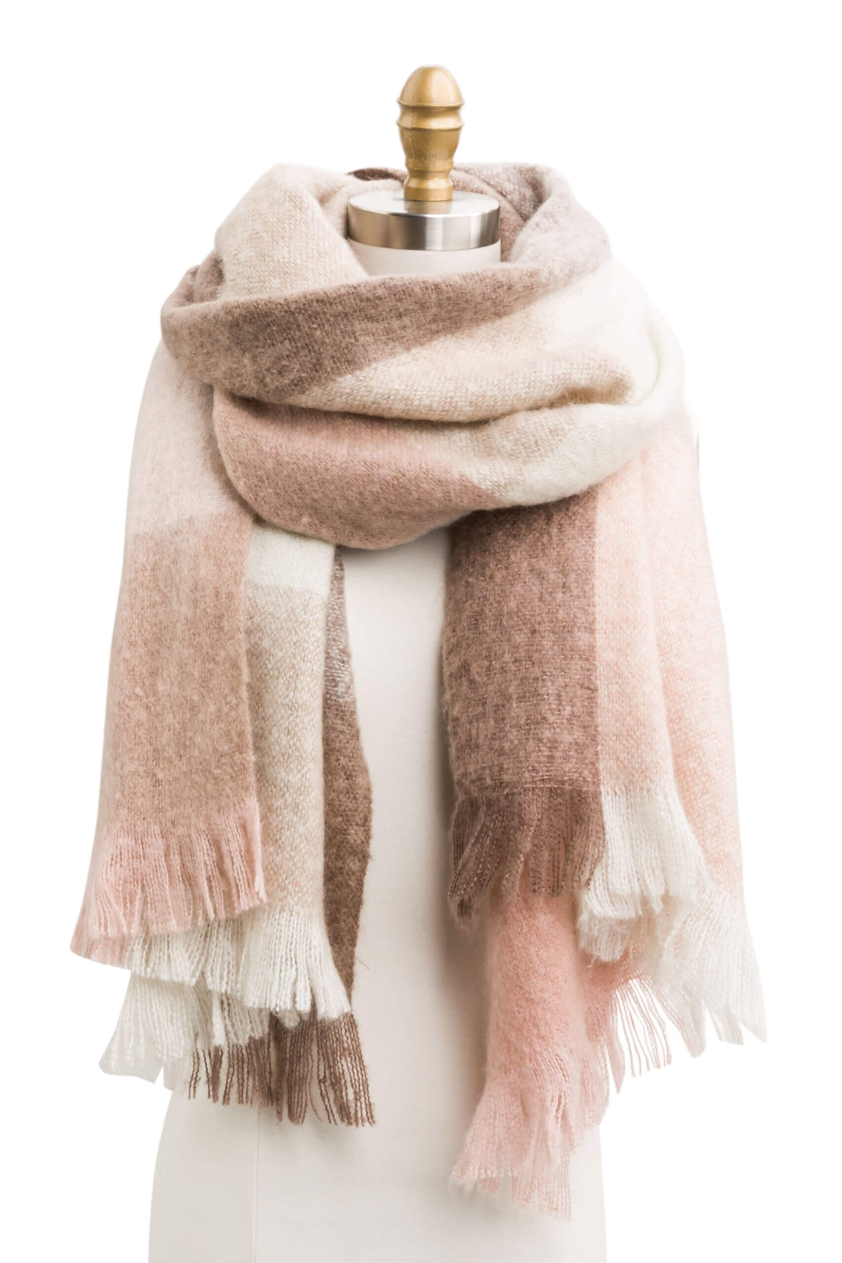 Stitch Fix women's white, tan and pink blanket scarf with fringe ends on bust form.