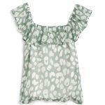 Stitch Fix women’s sleeveless green print blouse with ruffle trim.