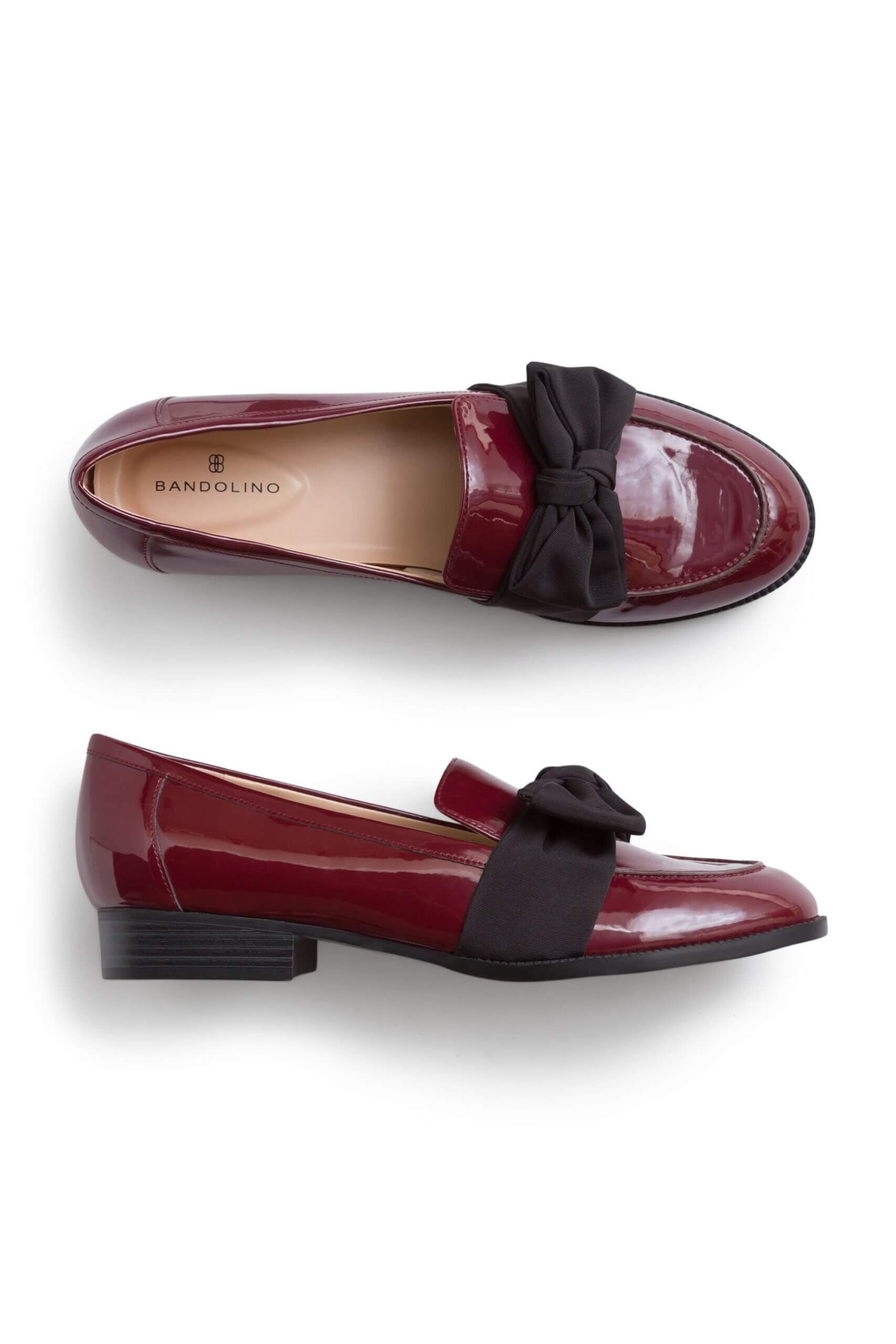 Stitch Fix women’s patent red leather loafers with black bows.
