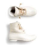Stitch Fix women’s white duck boots with brown laces.