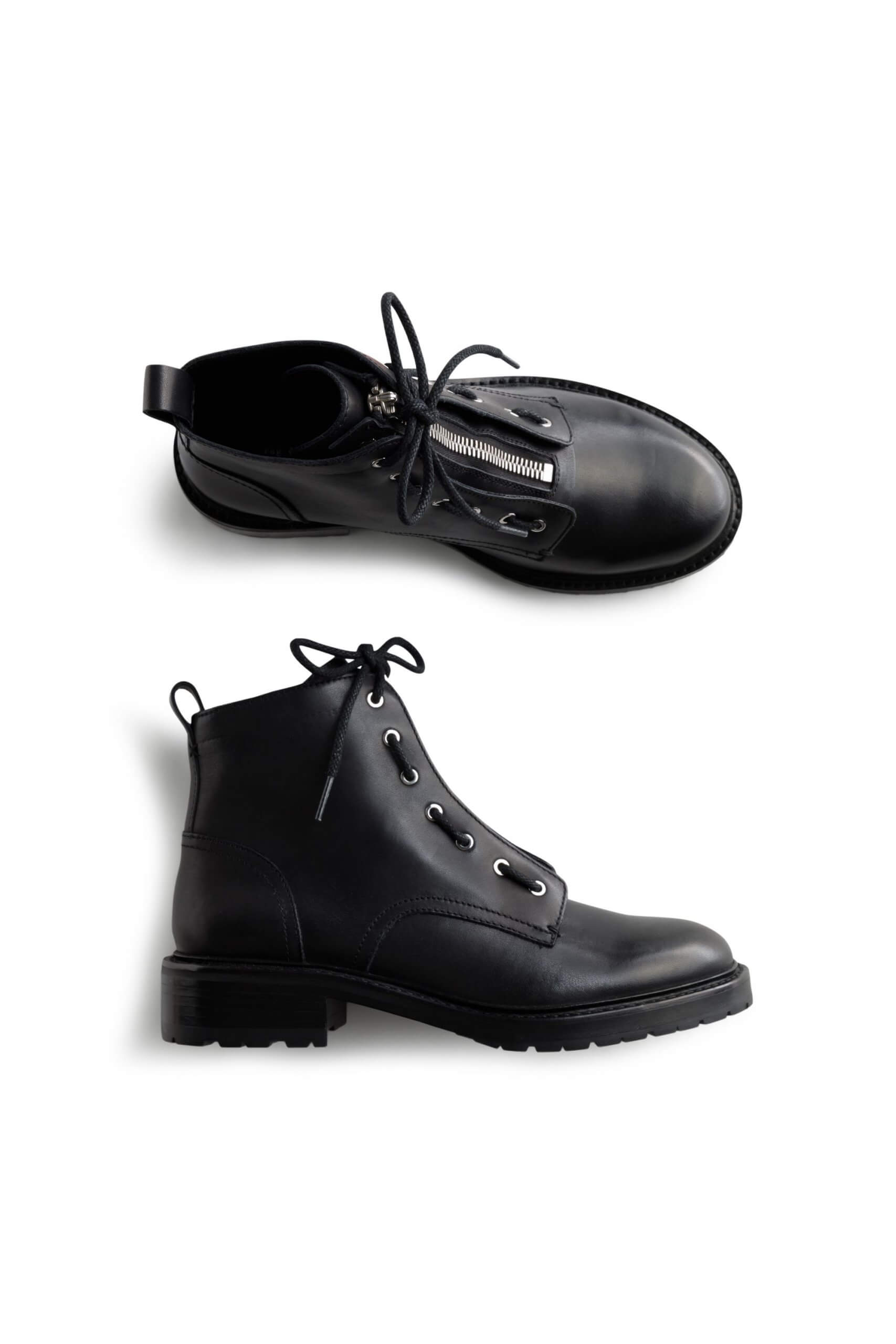 Stitch Fix Women’s black combat boot with zipper detailing.