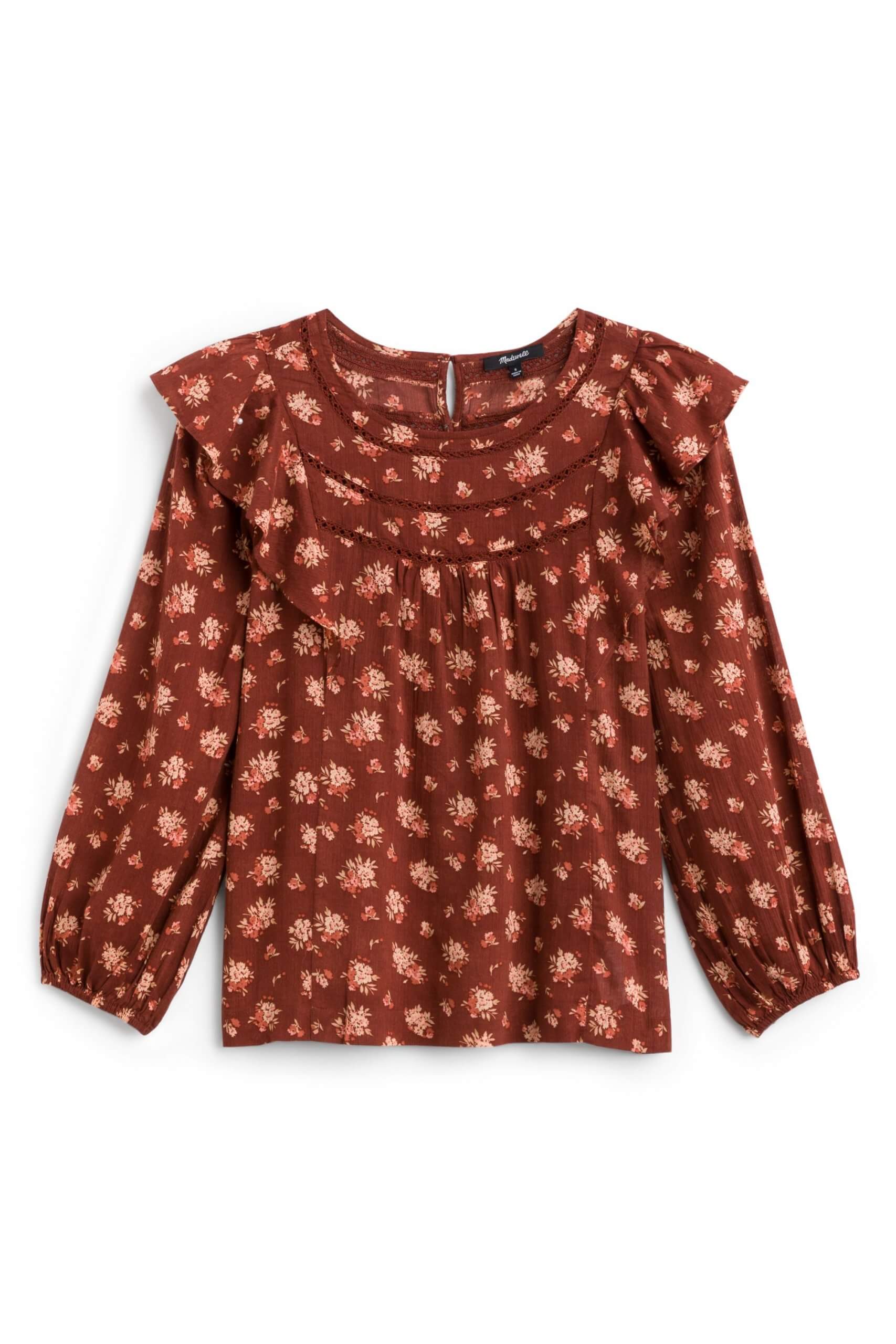 Stitch Fix women’s burnt orange and floral long sleeve ruffle neckline top.