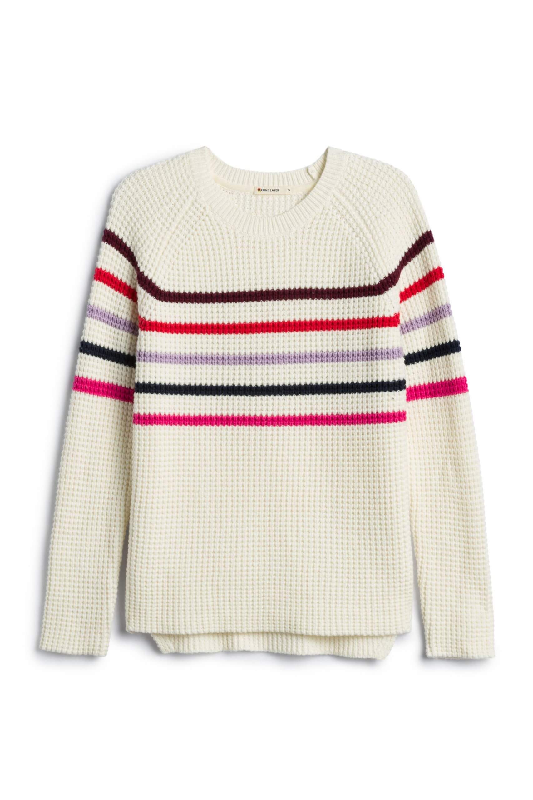Stitch Fix Women’s white sweater with multi-color stripes.