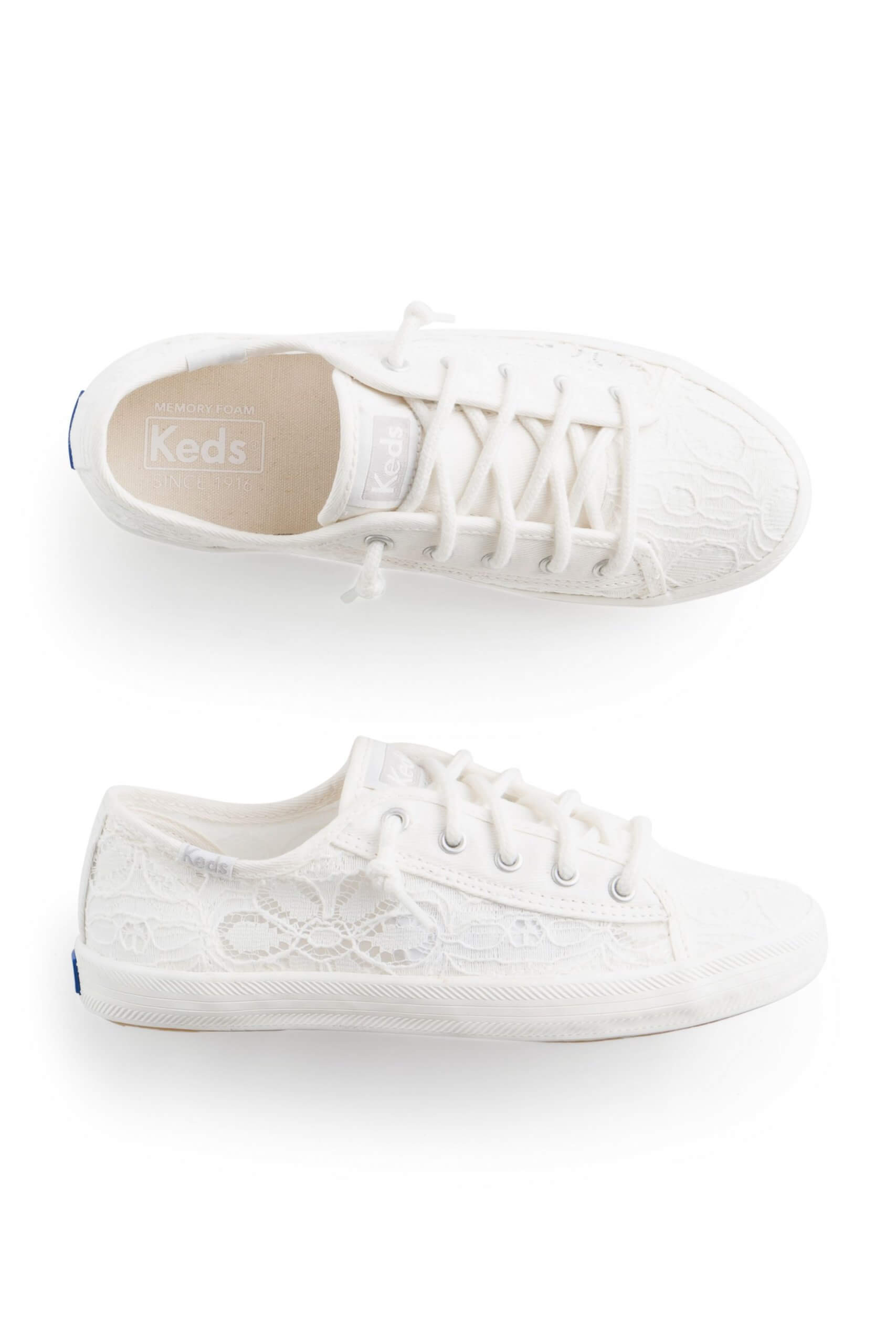 Stitch Fix women’s white lace-up sneakers with lace details.