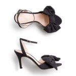 Stitch Fix women’s black ankle strap heels with bow detail.
