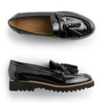 Stitch Fix women’s black lug sole loafers with tassels.
