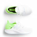 Stitch Fix women’s green accented white sneakers.