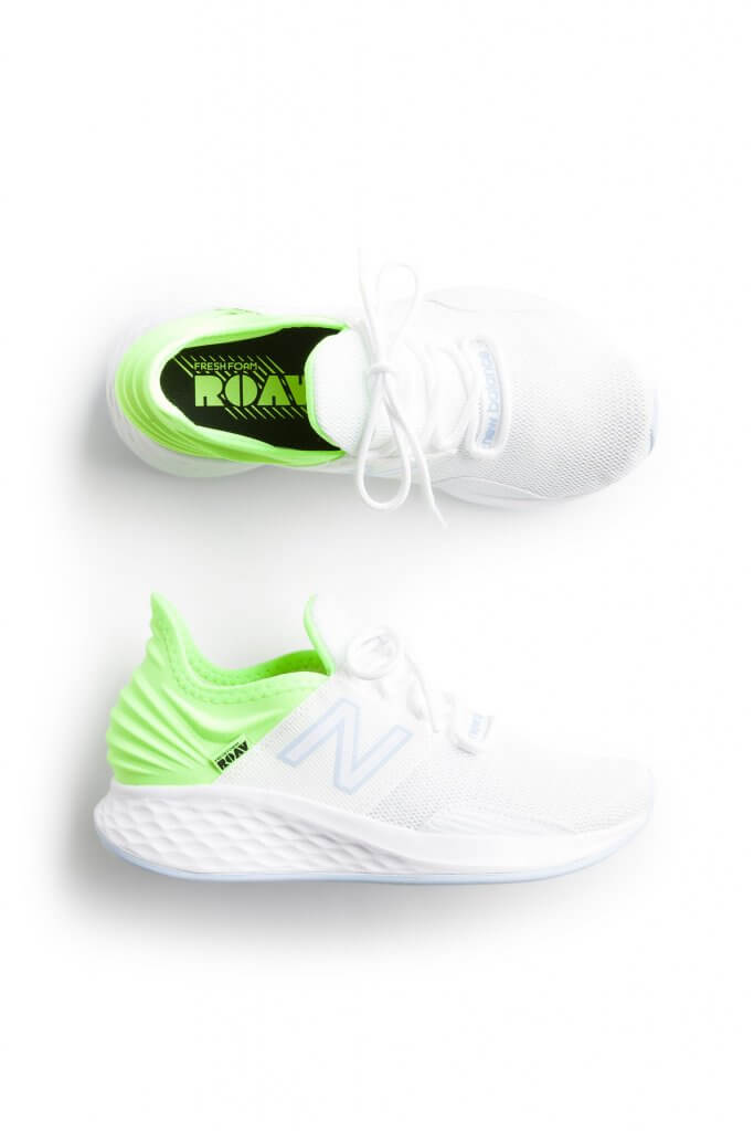 Stitch Fix women’s green accented white sneakers.