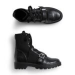 Stitch Fix women’s black leather combat boots with buckle detail.