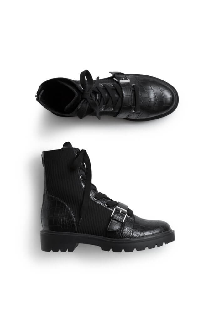 Stitch Fix women’s black leather combat boots with buckle detail.