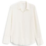 Stitch Fix women’s off-white blouse with small button-down details.