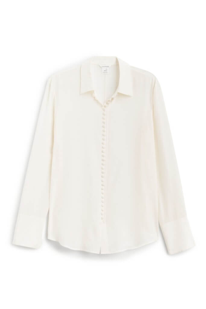 Stitch Fix women’s off-white blouse with small button-front closure.