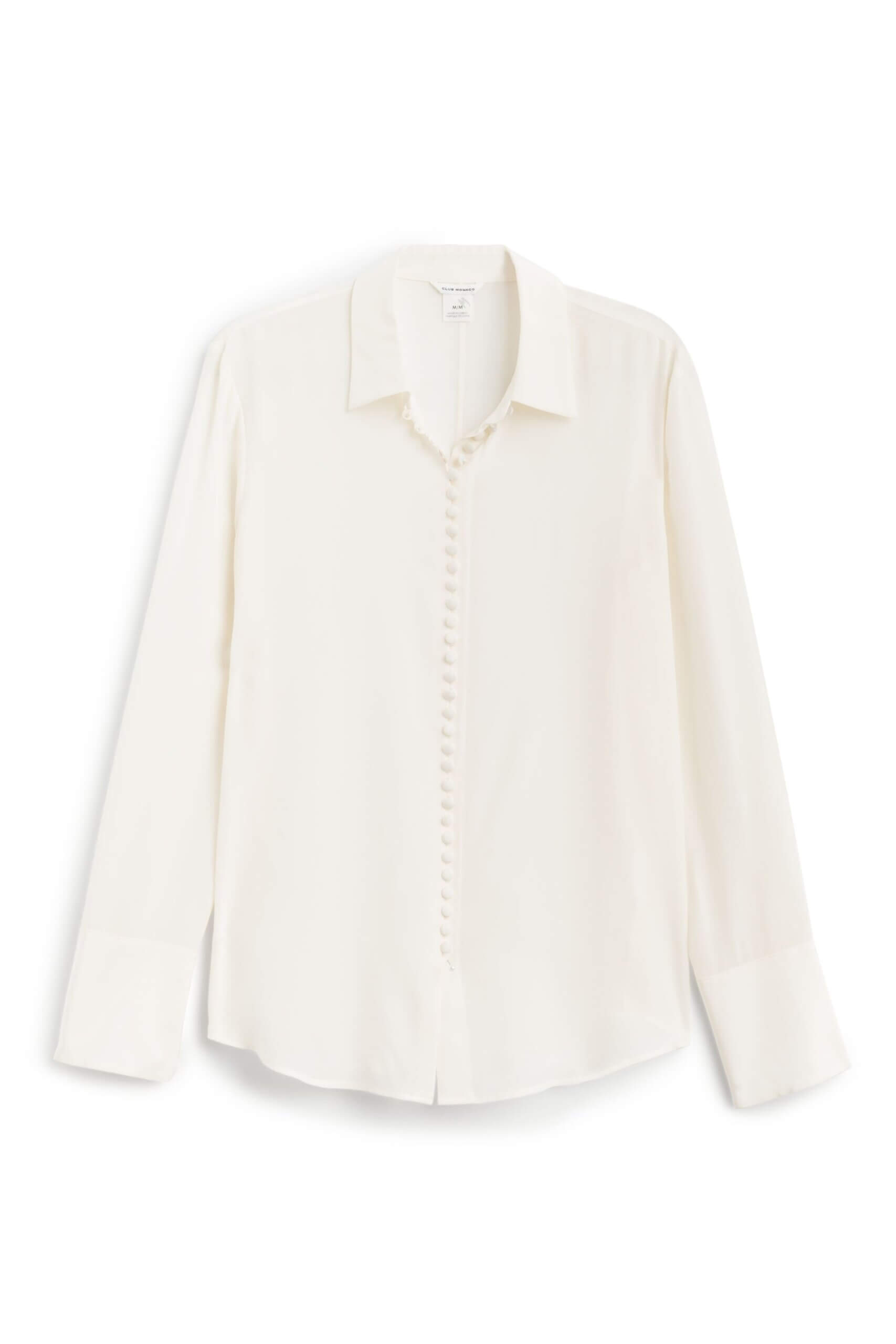 Stitch Fix women’s off-white blouse with small button-front closure.