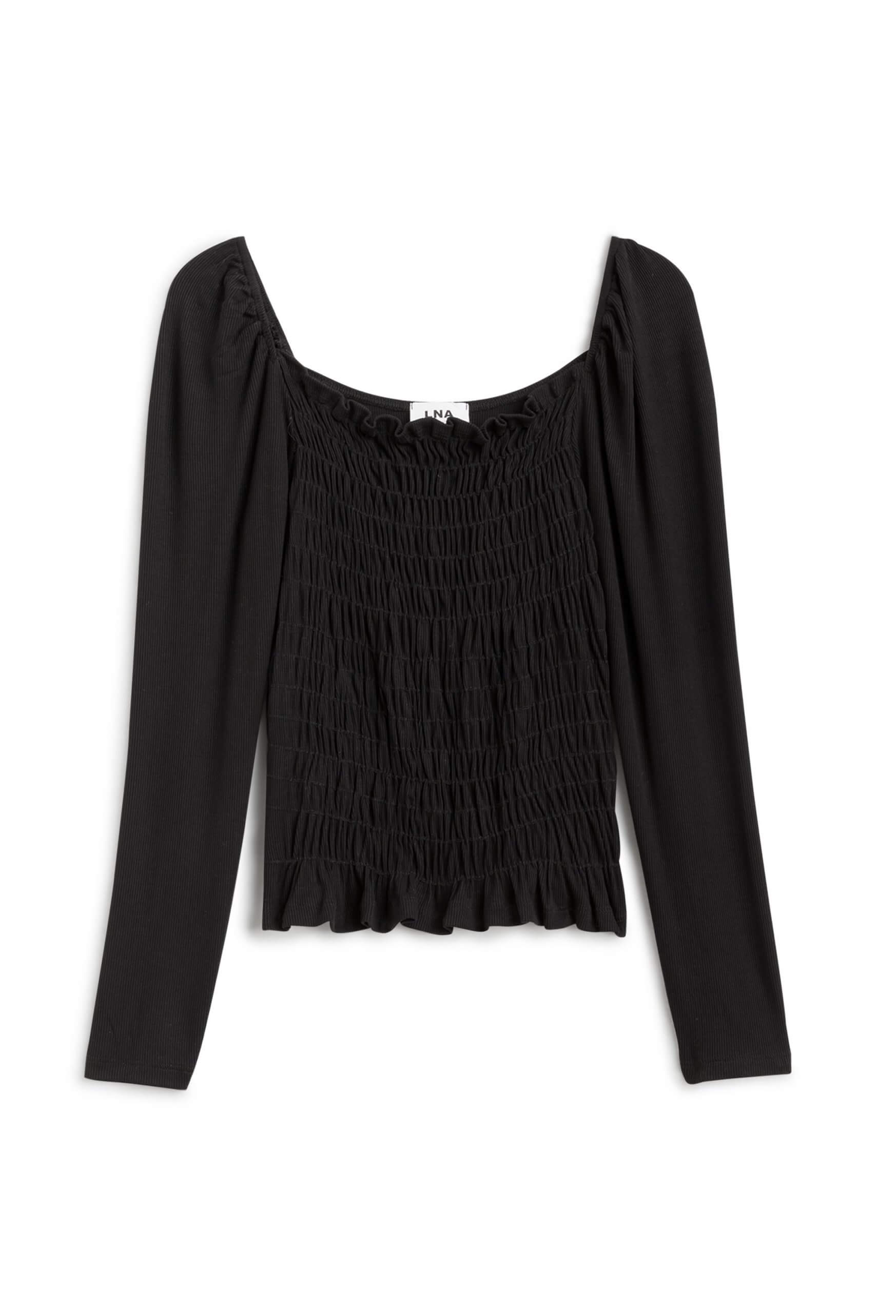 Stitch Fix Women’s black long-sleeved smocked top.
