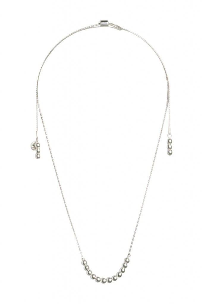 Stitch Fix women’s silver necklace with bead details.