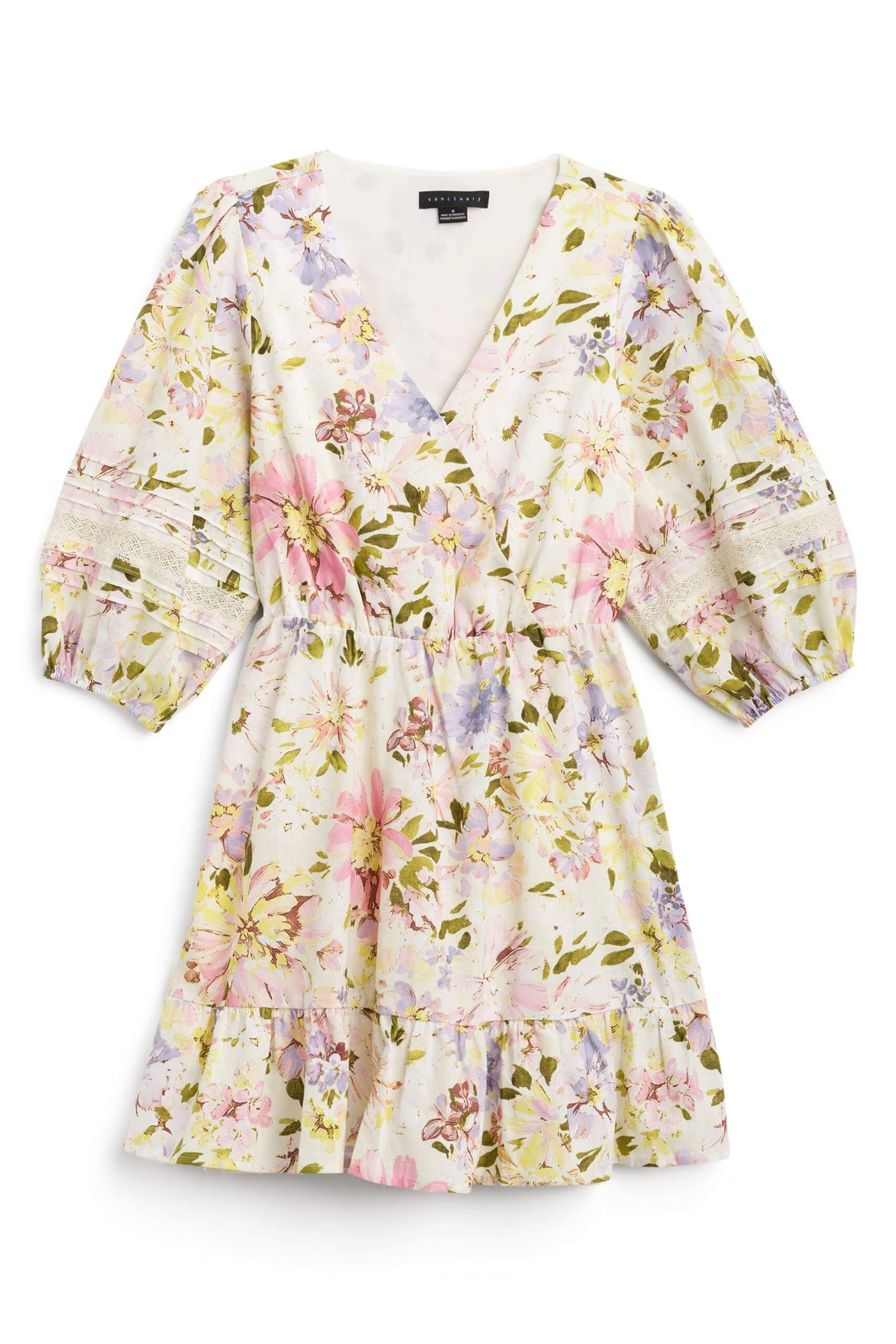 Stitch Fix Women's white floral dress with pink, purple and yellow floral details.