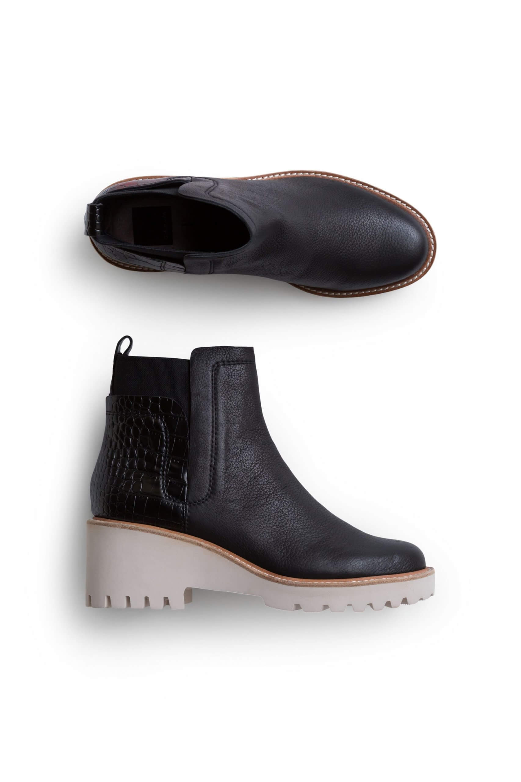 Stitch Fix women’s black leather boots with grey lug soles.