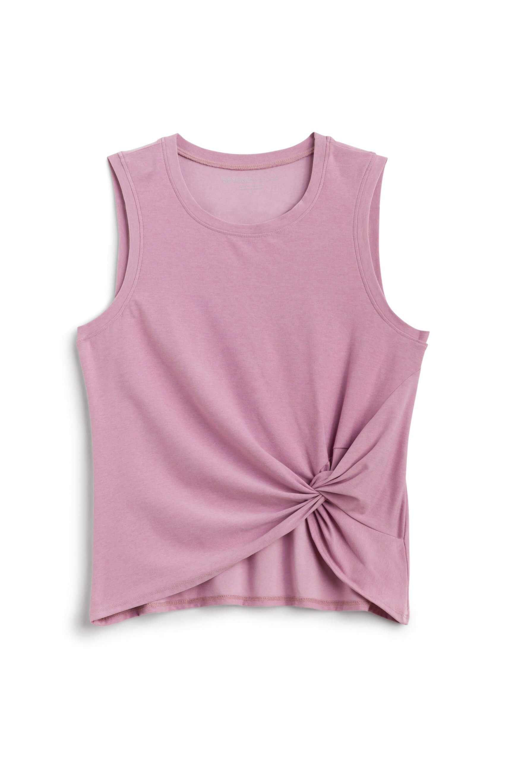 Stitch Fix Women’s light pink muscle tank with twist detail.
