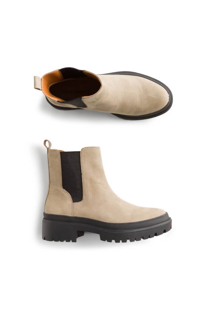Stitch Fix women’s beige Chelsea boots with black lug sole.