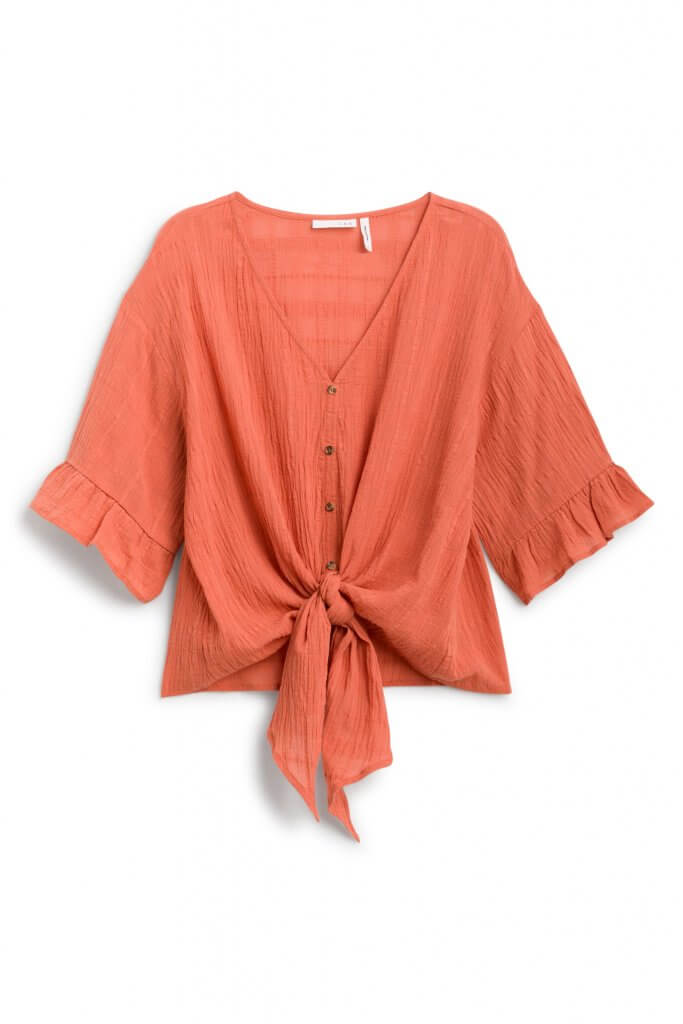 Stitch Fix women’s cropped orange short-sleeve shirt with buttons and tie front.