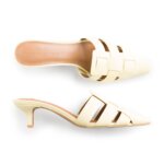 Stitch Fix women’s pale yellow slide kitten heels.