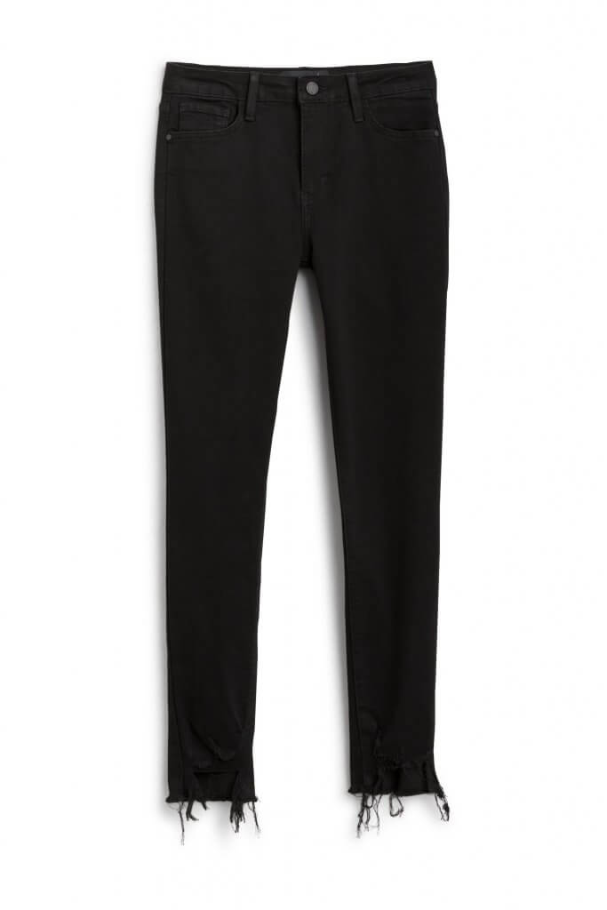 Stitch Fix women’s black skinny jeans with distressed hem.