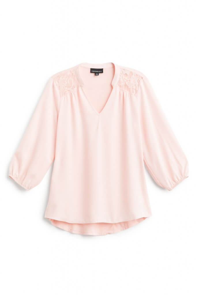 Stitch Fix women’s three-quarter sleeve light pink blouse with lace detail.