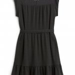 Stitch Fix women’s black dress with lace and cap sleeve detail.