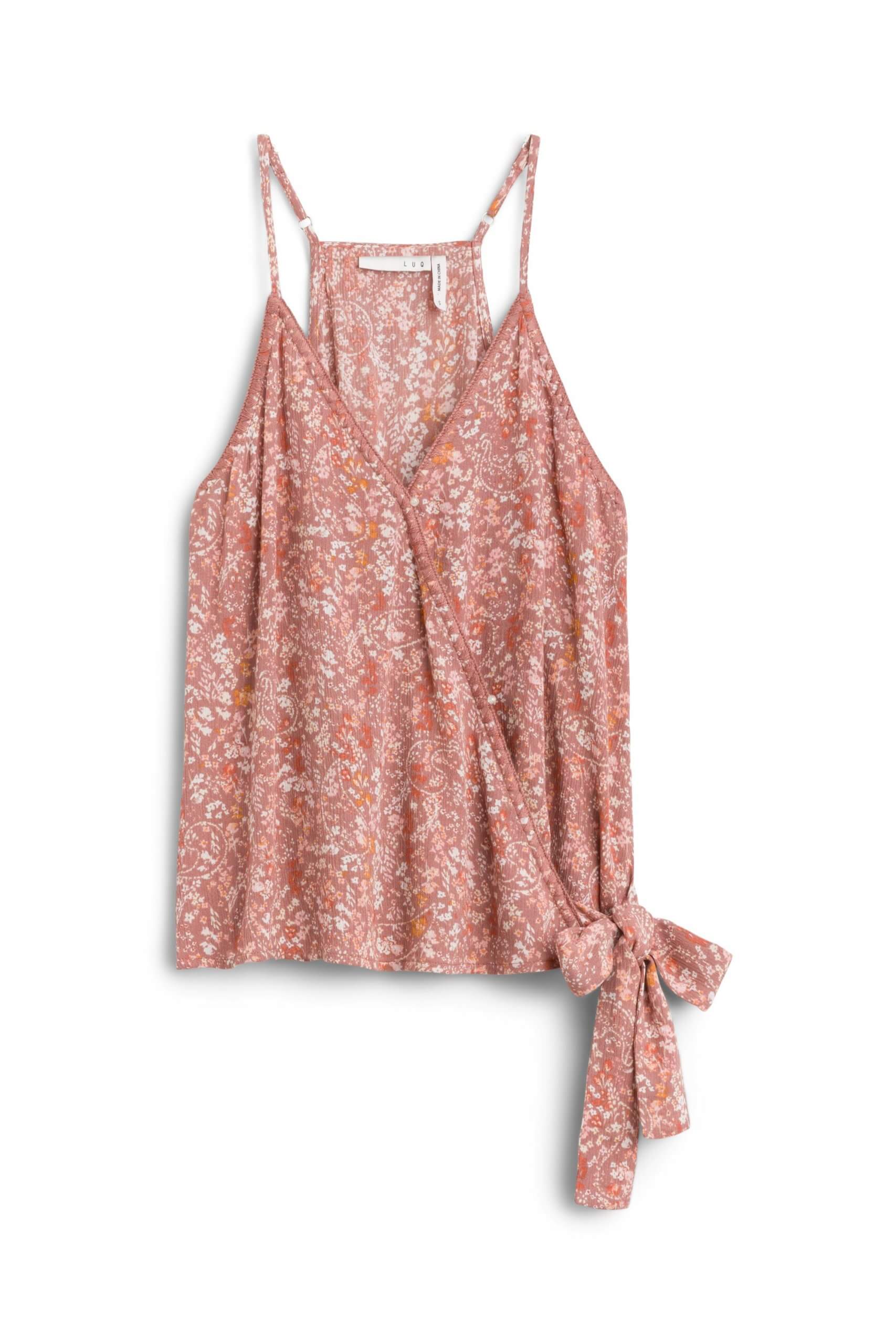 Stitch Fix women’s sleeveless pink floral print wrap blouse with side bow.